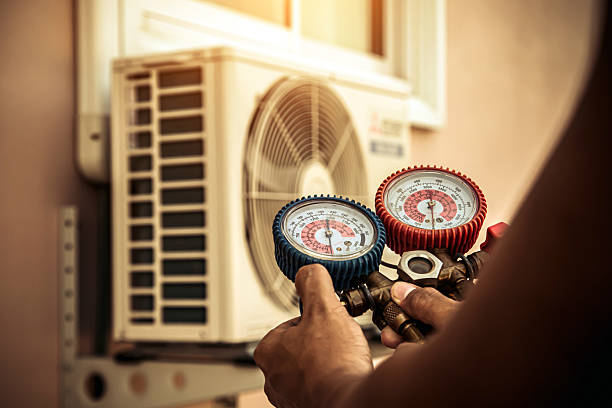 Professional Air Conditioning Service technician working in Bethany, MO